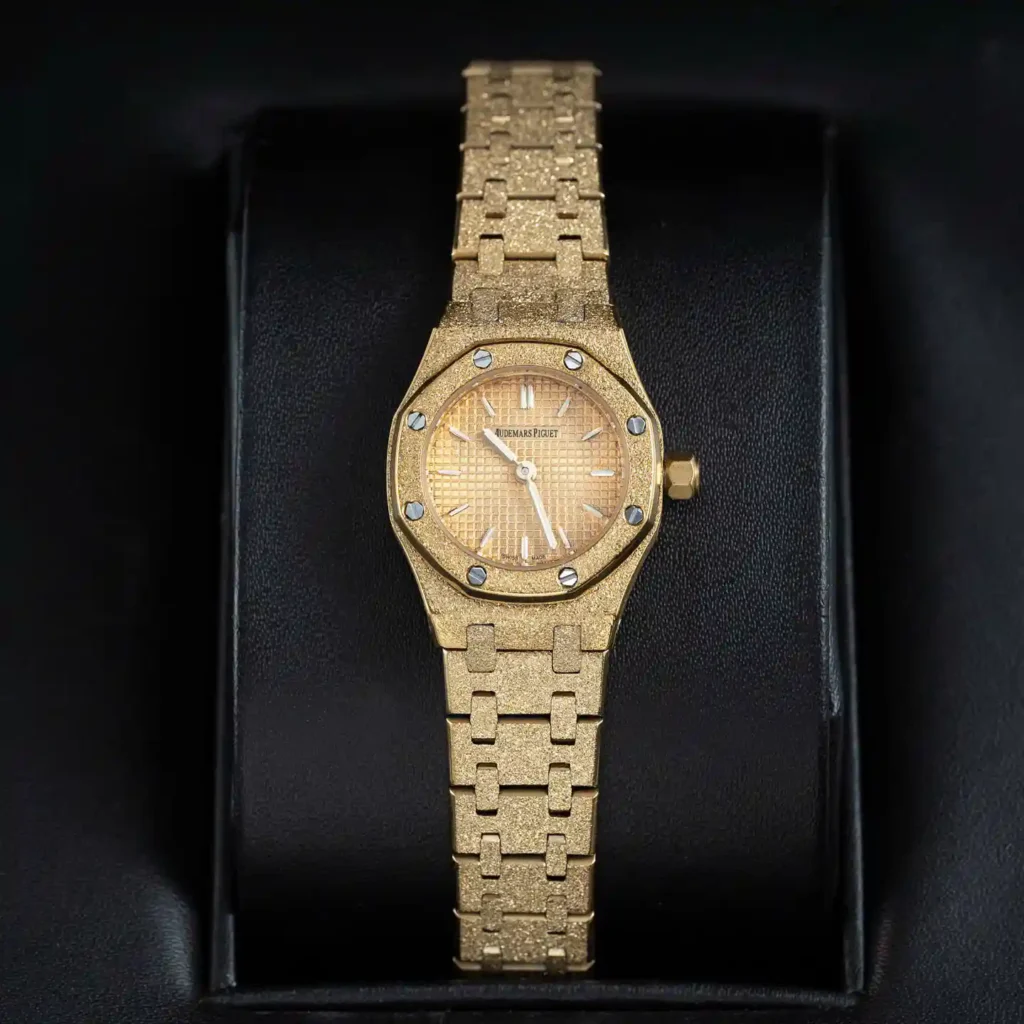 Super Clone Audemars Piguet Royal Oak Mini Frosted Gold 67630BA.GG.1312BA.01 — on leather display