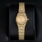 Super Clone Audemars Piguet Royal Oak Mini Frosted Gold 67630BA.GG.1312BA.01 — on leather display