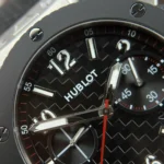 Super Clone Hublot Big Bang 20th Anniversary Titanium Ceramic 43mm 431.NM.1337.RX — on leather display