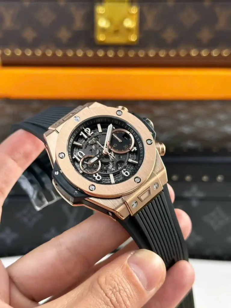 Super Clone Hublot Big Bang 42mm Rubber Strap Gold — on leather display
