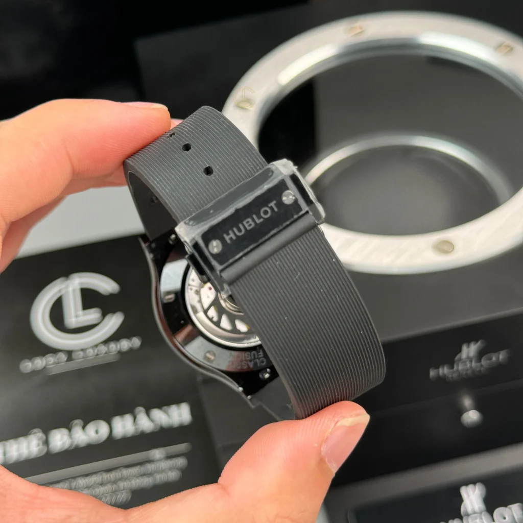 Super Clone Hublot Classic Fusion Ceramic Black 42mm Carbon Dial JJZ Base — on leather display