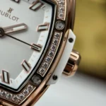 Super Clone Hublot Spirit of Big Bang King Gold White Pavé 662.OE.2080.RW.1604 — on leather display
