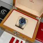 Super Clone Omega Seamaster Diver James Bond 60th Anniversary 210.30.42.20.03.002 42mm Blue Dial Steel — on leather display