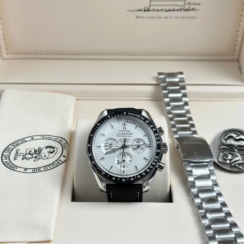 Super Clone Omega Speedmaster Apollo 13 Silver Snoopy 311.32.42.30.04.003 42mm — on leather display