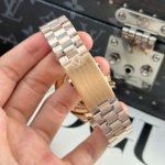 Super Clone Omega Steel — on leather display