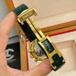 Super Clone Omega Speedmaster Moonwatch Professional 42mm 310.63.42.50.10.001 Green Dial Yellow Gold — movement / caseback view