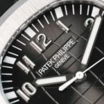 Super Clone Patek Philippe Aquanaut 40mm Rubber Strap Steel — on leather display
