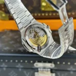 Super Clone Patek Philippe Patek Nautilus 5713G Green Dial 40mm Moissanite – Handcrafted Diamod — on leather display