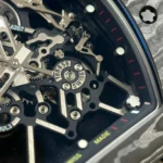 Super Clone Richard Mille RM 35-01 Richard Mille Rafa Cacbon NTPT Full Black 42mm — on leather display