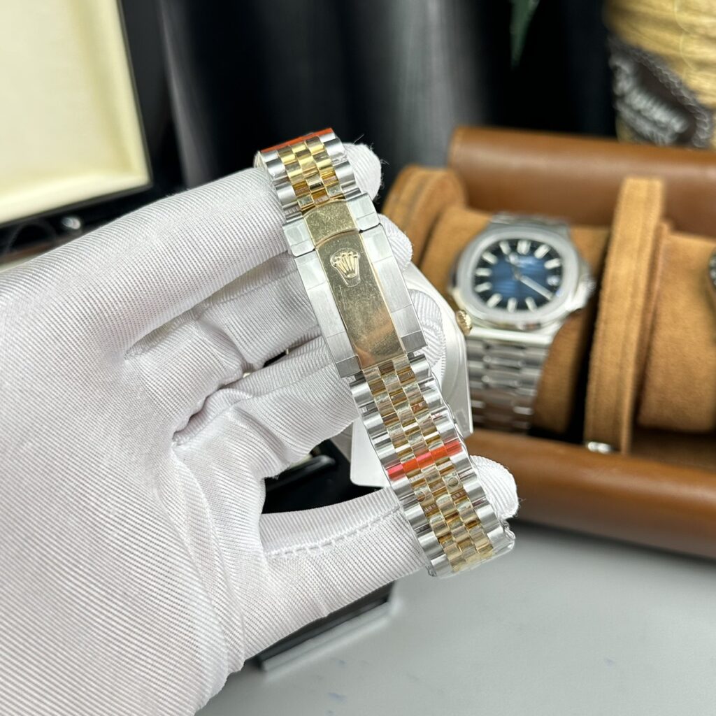 Super Clone Rolex Datejust Champagne Dial 126333-0010 41 mm — on leather display