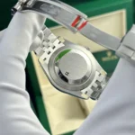 Super Clone Rolex Datejust Green Dial 126334 Jubilee 41 mm — on leather display