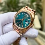 Super Clone Rolex Day-Date Blue-Green Diamond Dial 128235-0085 36 mm — on leather display