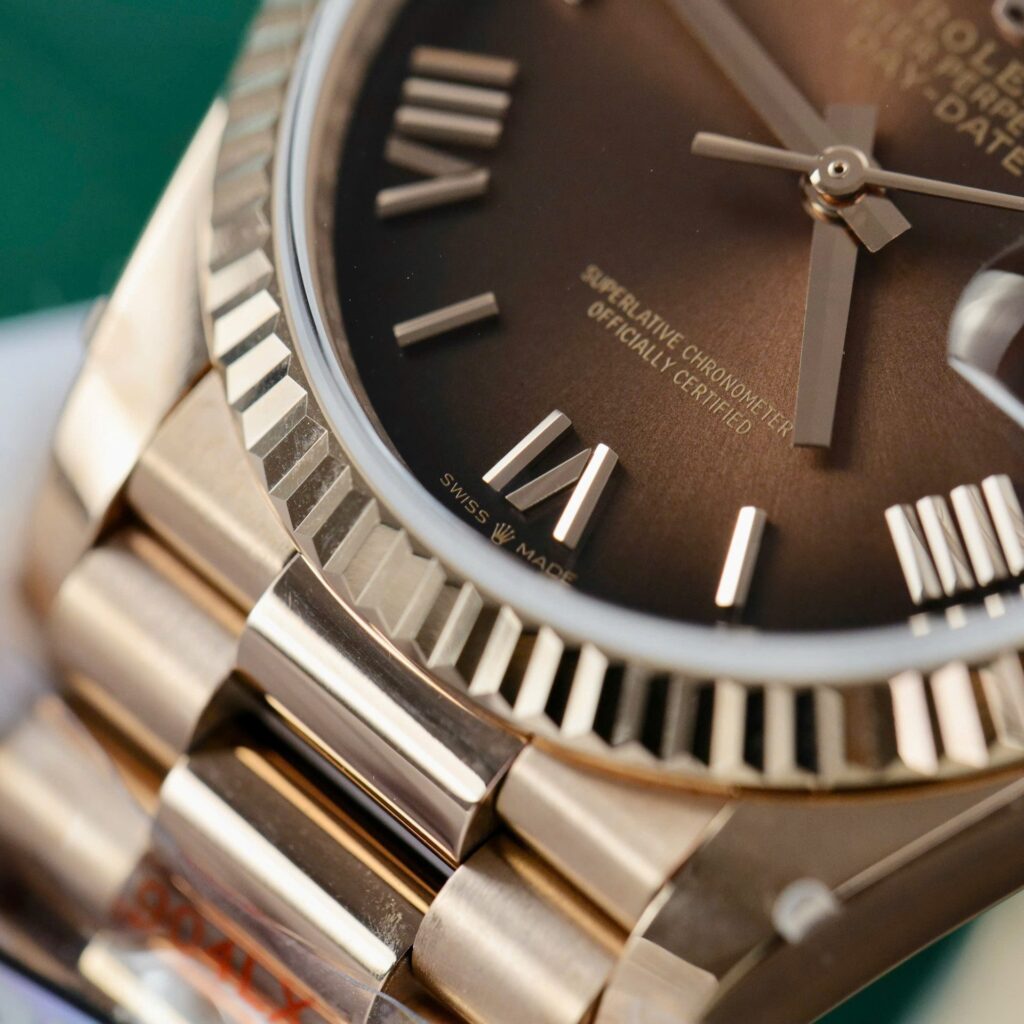 Super Clone Rolex Day-Date Brown Ombré Dial 128235-0075 36 mm — on leather display