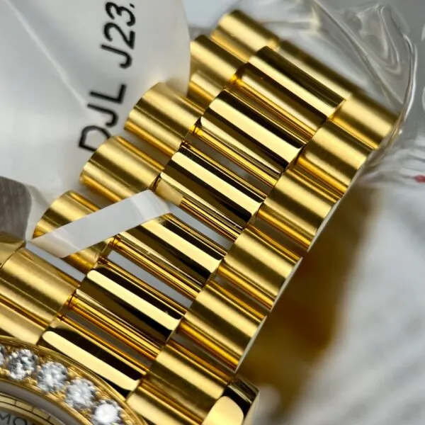 Super Clone Rolex Day-Date Champagne Dial 128398tbr-0037 36 mm — on leather display