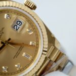 Super Clone Rolex Day-Date Champagne Diamond Dial 128238-0008 36 mm — on leather display