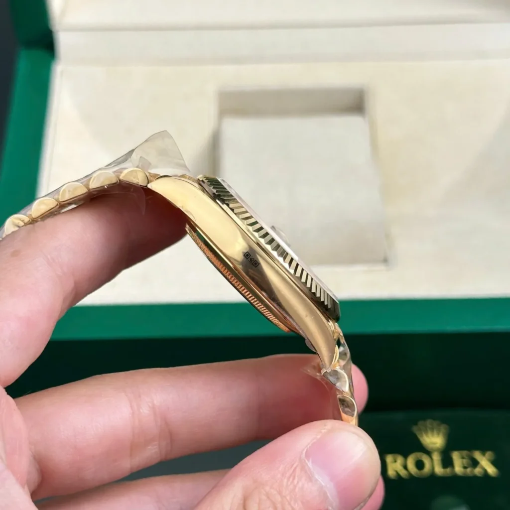 Super Clone Rolex Day-Date II Champagne Dial 228238 40 mm — on leather display
