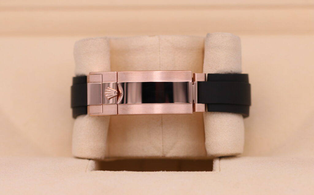 Super Clone Rolex Daytona Sundust Dial in Everose Gold 126515LN — on leather display
