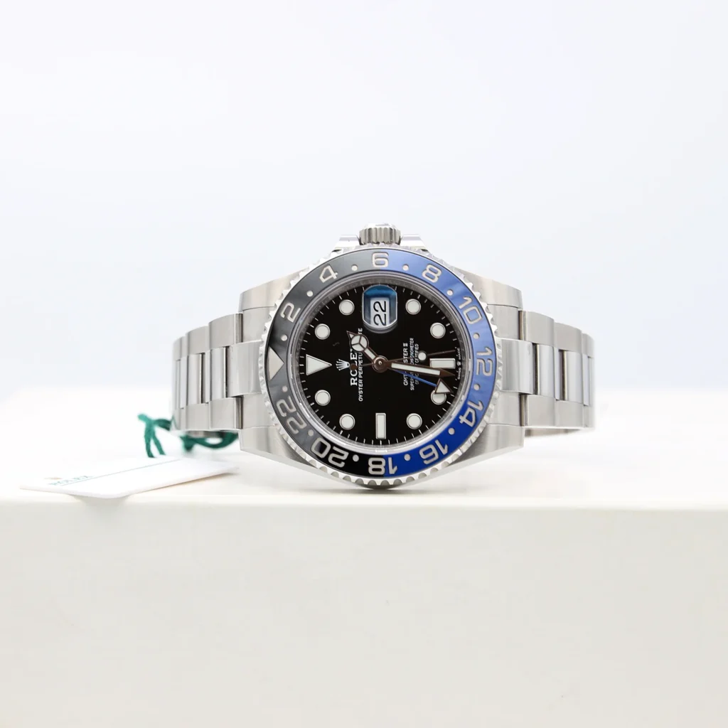 Super Clone Rolex GMT-Master II 126710BLNR “Batman” — on leather display