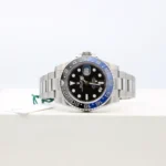Super Clone Rolex GMT-Master II 126710BLNR “Batman” — on leather display
