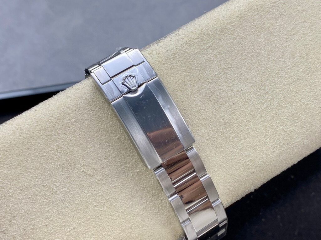 Super Clone Rolex GMT-Master II 126710GRNR “Bruce Wayne” Oyster 2024 — on leather display