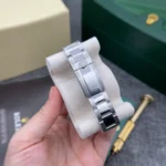 Super Clone Rolex GMT-Master II Black Dial 116710 — on leather display