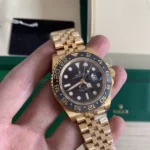Super Clone Rolex GMT-Master II Black Dial 126718GRNR — on leather display