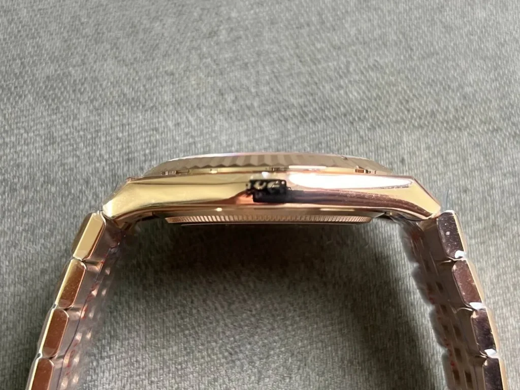 Super Clone Rolex Land-Dweller 40 mm Everose gold (2025) — on leather display