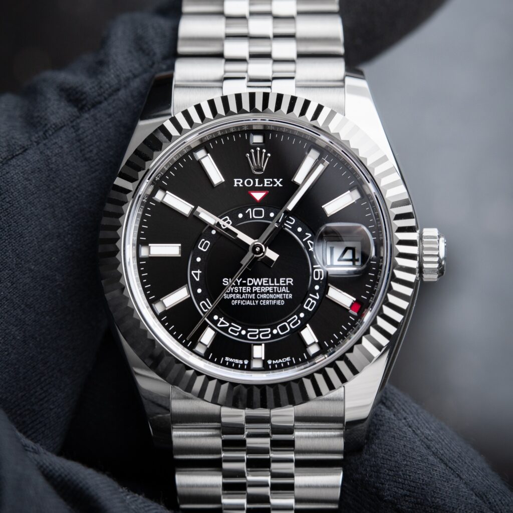 Super Clone Rolex Sky-Dweller Bright black Dial 336934 Jubilee — on leather display