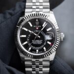 Super Clone Rolex Sky-Dweller Bright black Dial 336934 Jubilee — on leather display