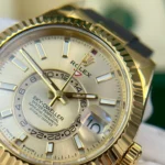 Super Clone Rolex Sky-Dweller Champagne Dial 336238 — on leather display