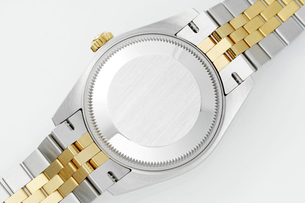 Super Clone Rolex Datejust Champagne Diamond Dial 126283RBR-0003 36 mm — on leather display