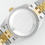 Super Clone Rolex Datejust Champagne Diamond Dial 126283RBR-0003 36 mm — on leather display