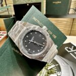 Super Clone Audemars Piguet Royal Oak Jumbo Extra-Thin 15206PT.OO.1240PT.01 39mm Black Dial — on leather display