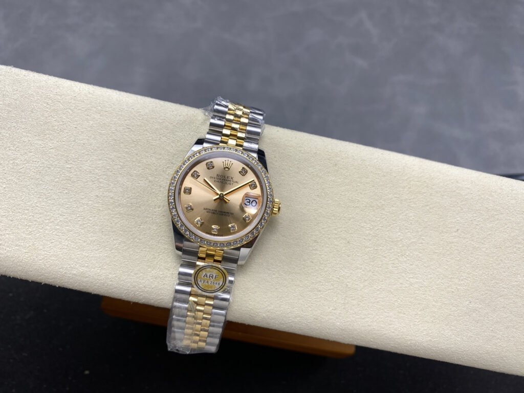 Super Clone Rolex Datejust Gold Dial SRL40 36 mm — on leather display