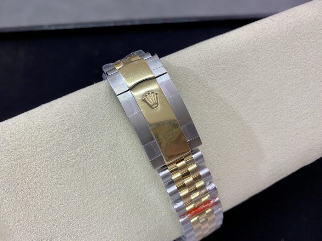 Super Clone Rolex Datejust Olive Green Roman Diamond Dial 126233-0026 36 mm — on leather display