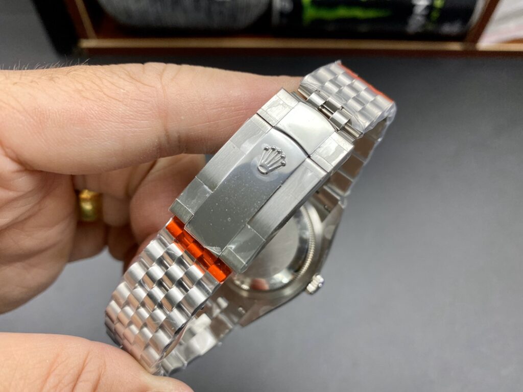 Super Clone Rolex Datejust Silver Roman Diamond Dial 126234-0029 36 mm — on leather display